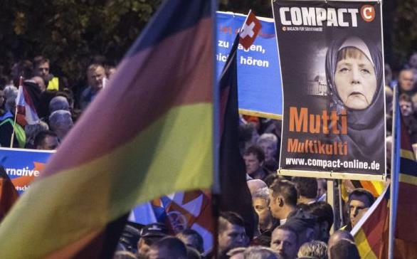 H Μέρκελ παίρνει πάνω της το προσφυγικό ενώ οι ρωγμές ανοίγουν